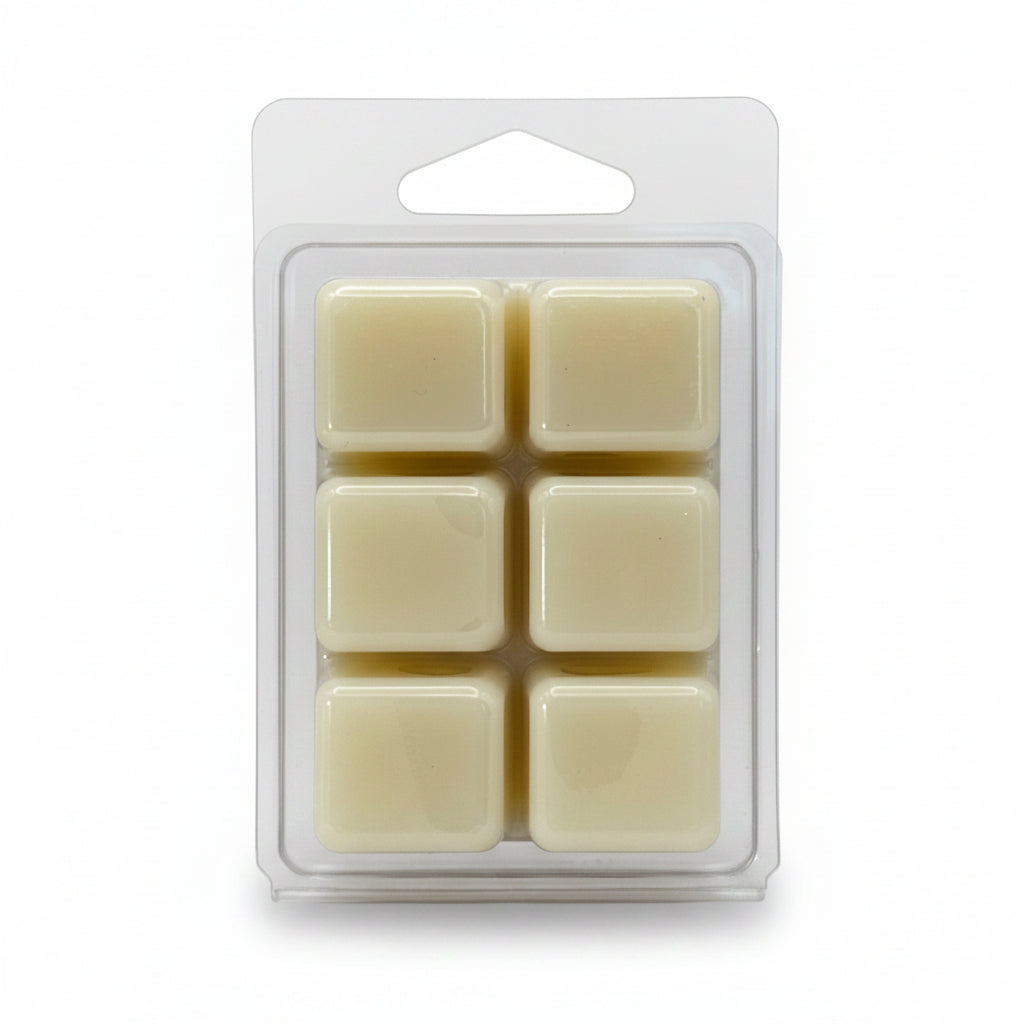 Scentarama Six cream-colored wax melts in baby powder scent in a clear plastic clamshell package, set against a plain light white background.