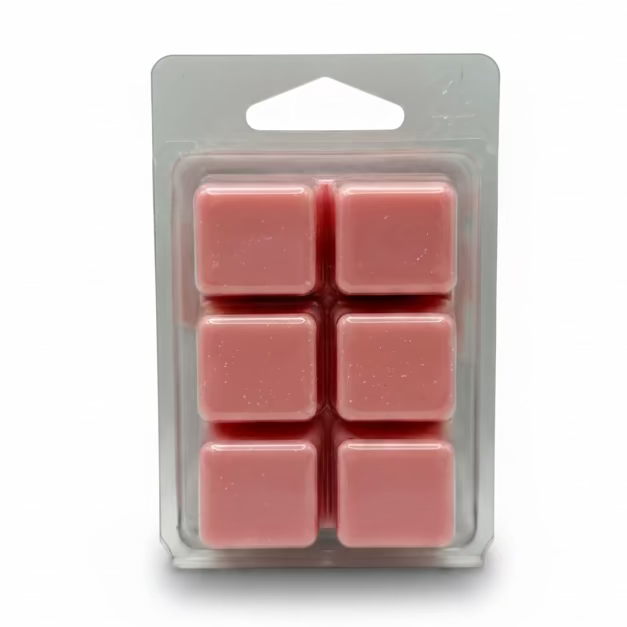 Six pink square wax melts in Blissful Berries scent in a clear plastic clamshell package on a light gray background.