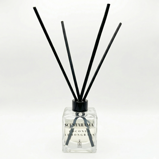 Scentarama diffuser with black sticks on a white background