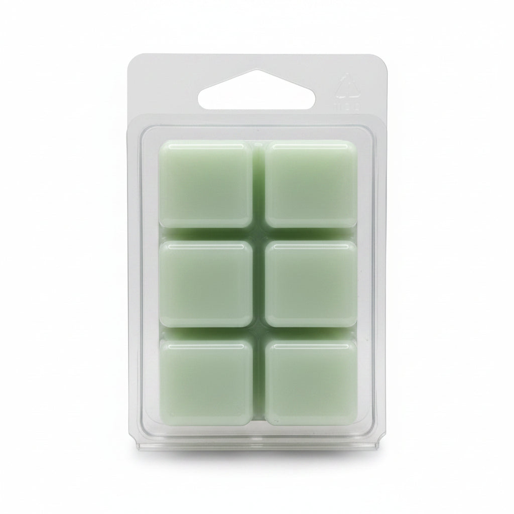 Six pale mint green wax melts in a clear plastic clamshell package on a light gray background.