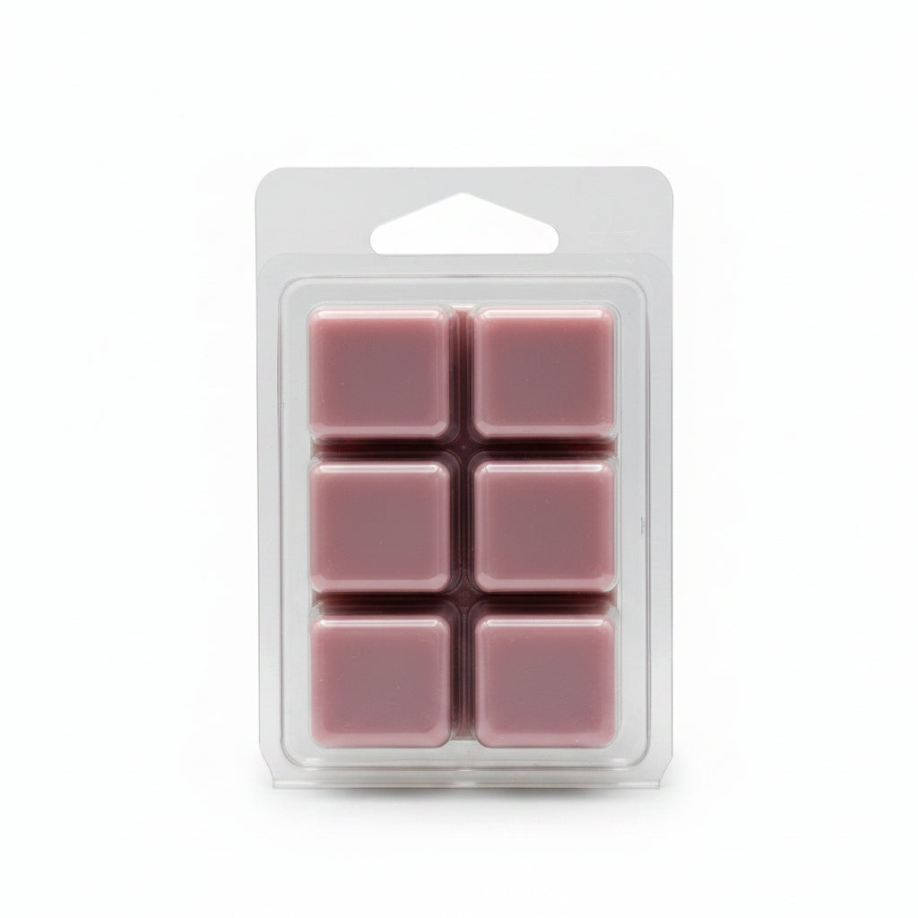 Six pink square wax melts in a clear plastic clamshell package on a light gray background.
