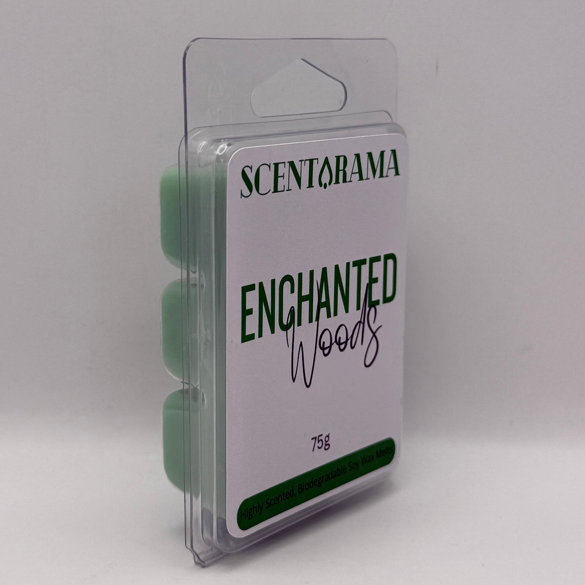 Scentarama Enchanted Woods 75g wax melt in its clear plastic clamshell packaging, showing three pale green wax pucks and a white label with green and black text.