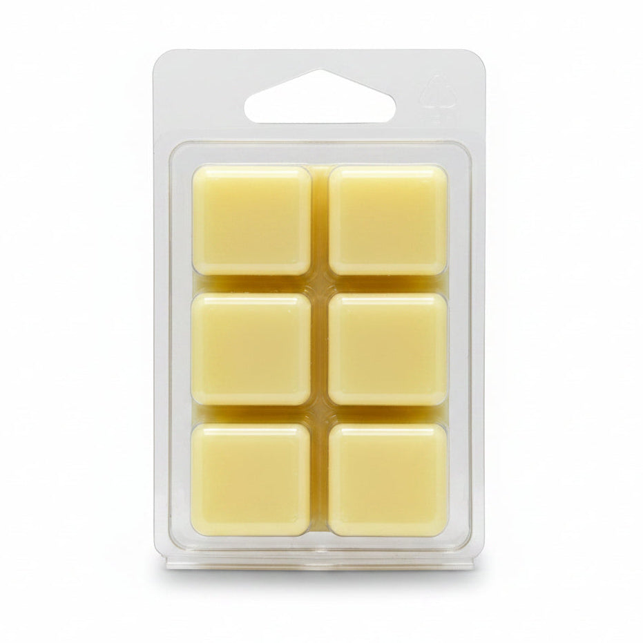 Six pale yellow Gardenia in Bloom soy wax melts by Scentarama in a clear plastic clamshell package on a light gray background.