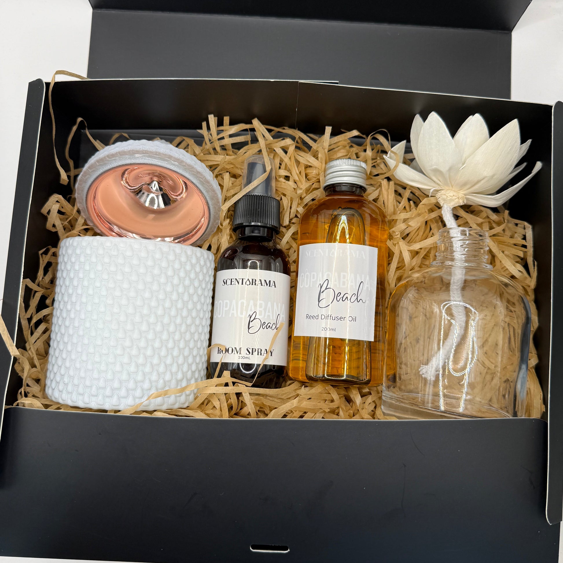 Scentarama Gift set with bottles and a candle in a black box