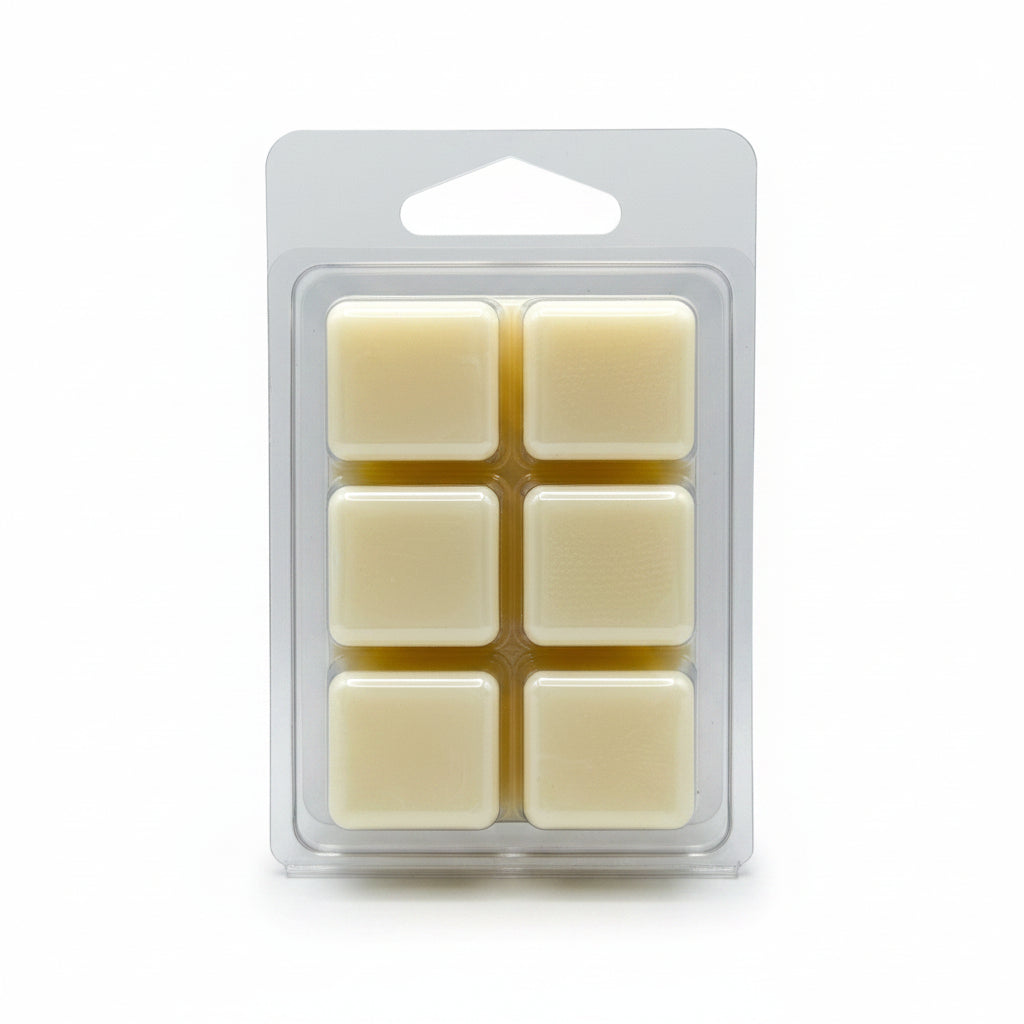 Six small square cream-colored wax melts in Musk Ado About Nothing Fragrance by Scentarama arranged in a clear plastic clamshell package on a light gray background.