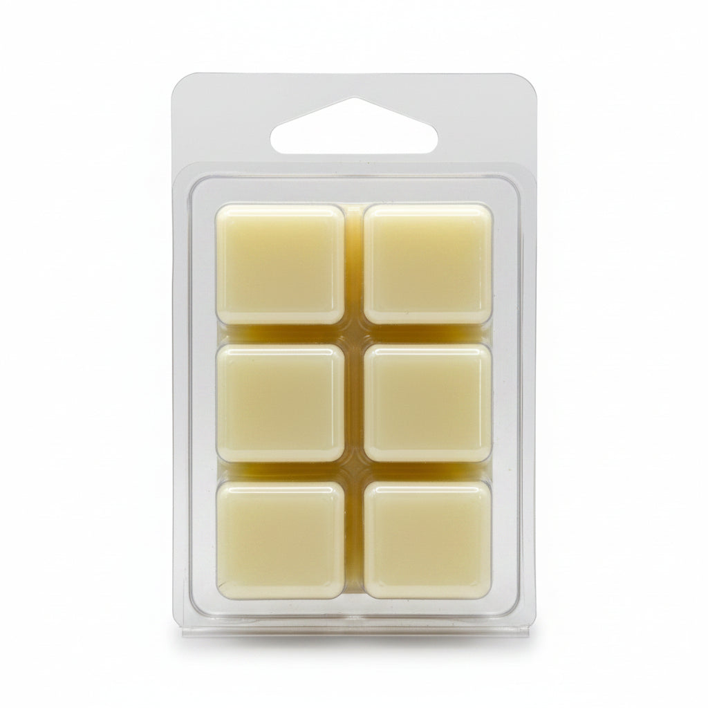 Six pale yellow wax melt cubes by Scentarama in Orchid and Lillies scent in a clear plastic clamshell package, photographed against a plain light white background. 