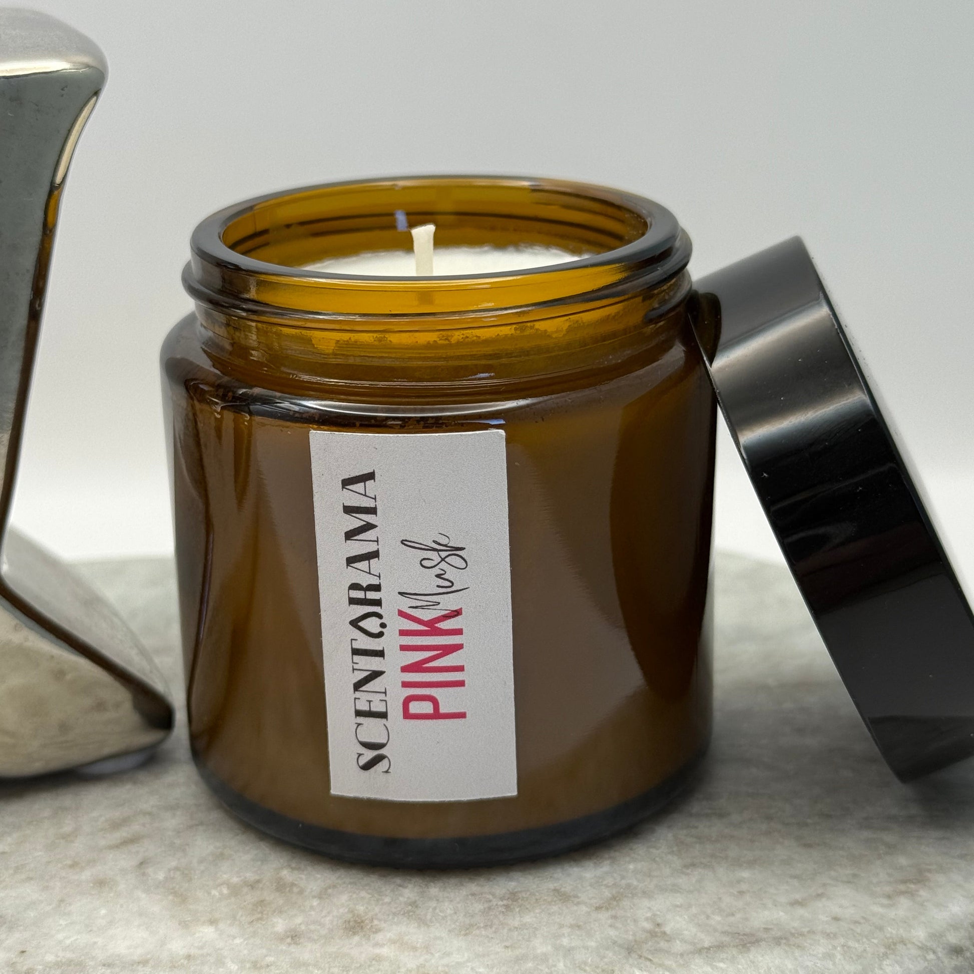 Amber colored Candle Jar in Pink Musk Scent