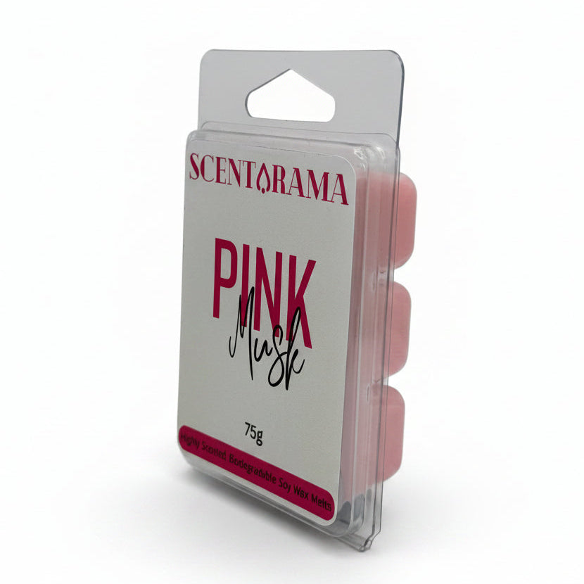 Scentarama Pink Musk wax melts in a clear plastic clamshell package with a white label and pink wax visible inside, photographed on a light gray background.