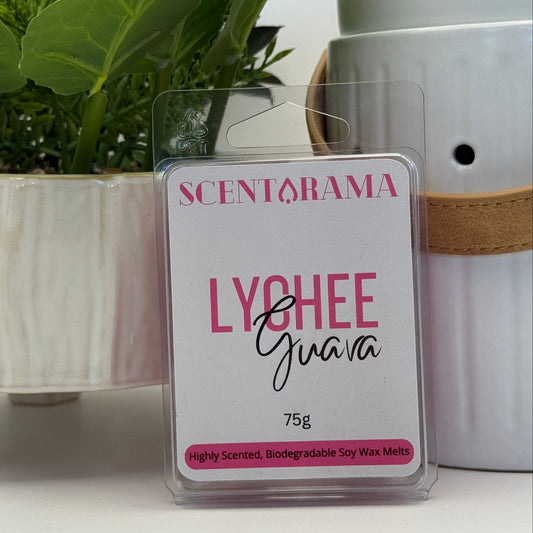Scentarama Lychee Guava soy wax melts with packaging and plant in the background