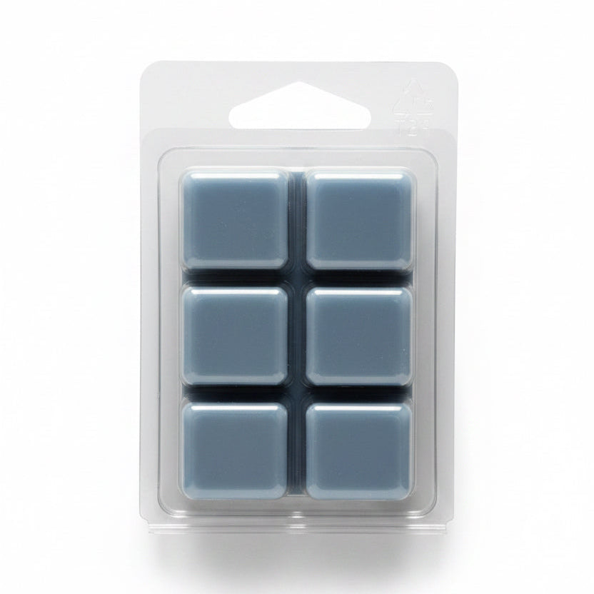 Six clear sinus relief soy wax melts by Scentarama in a plastic packaging on a beige background
