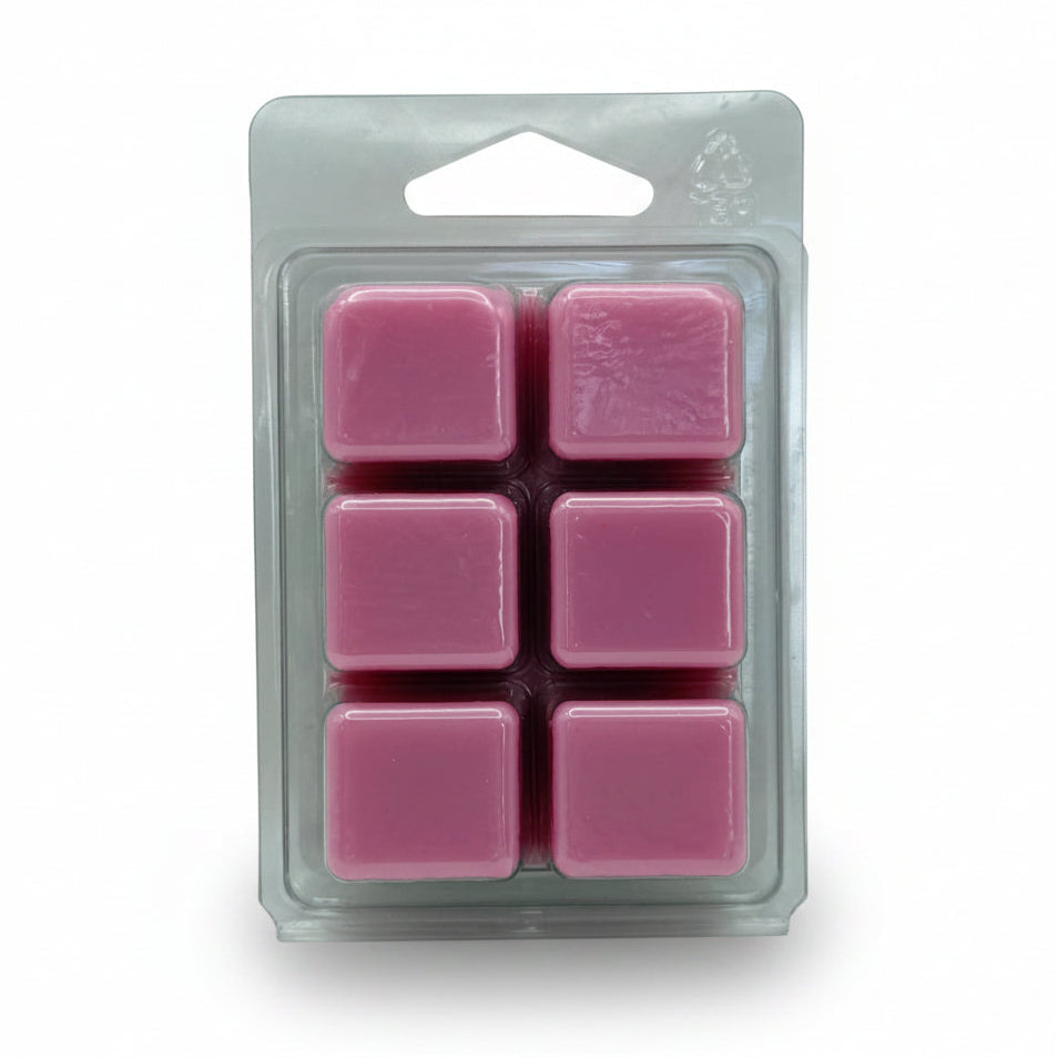 Six pink Strawberry Fizz wax melts by Scentarama in a clear plastic clamshell package on a light gray background.