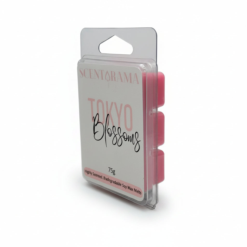 Scentarama Tokyo Blossoms soy wax melts in a clear plastic clamshell package with a white and pink label, showing three pink wax melts inside.